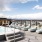 an outdoor spa with city views