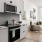 an open kitchen next to a living room