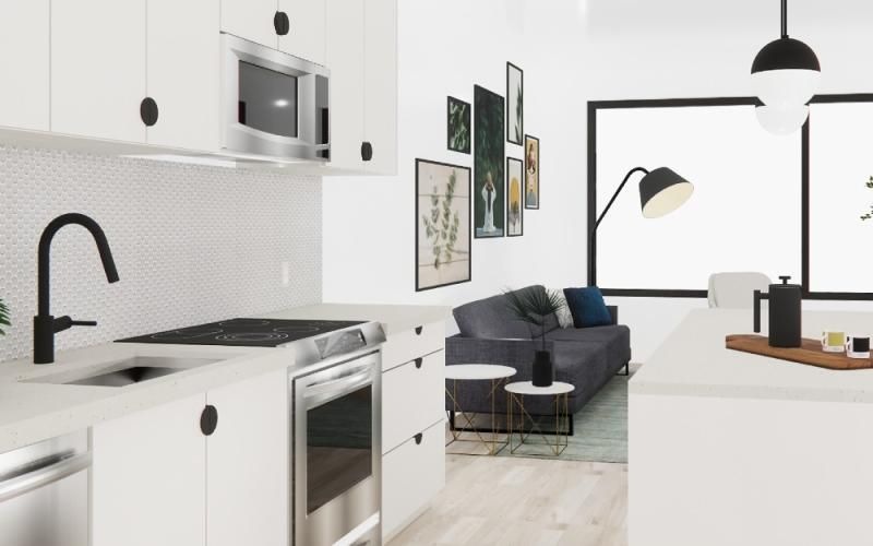 a kitchen with white cabinets